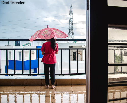 Enjoying Rains with Daughter