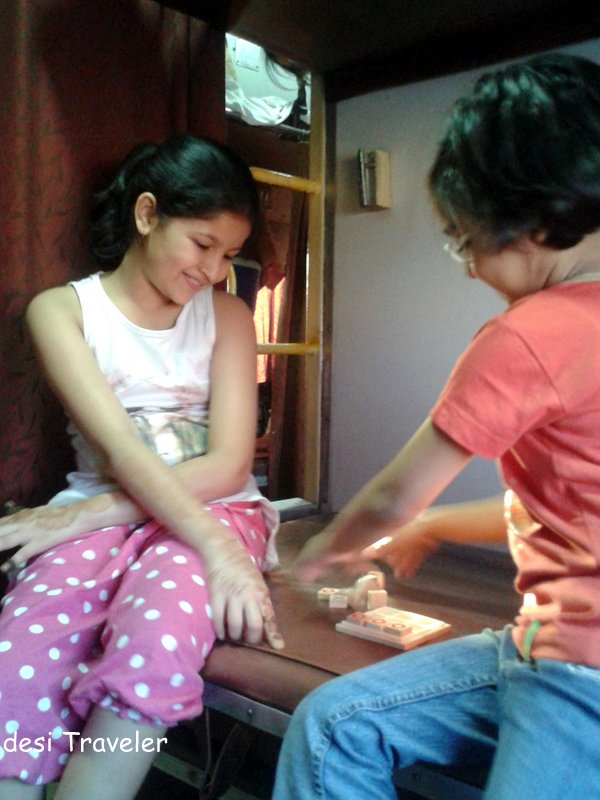 kids playing tic tac toe in Train